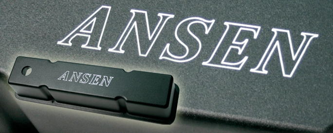Engraved metal engine part.