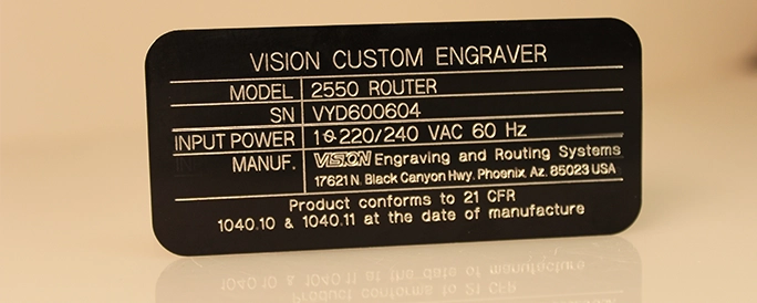 Engraved metal black tag.